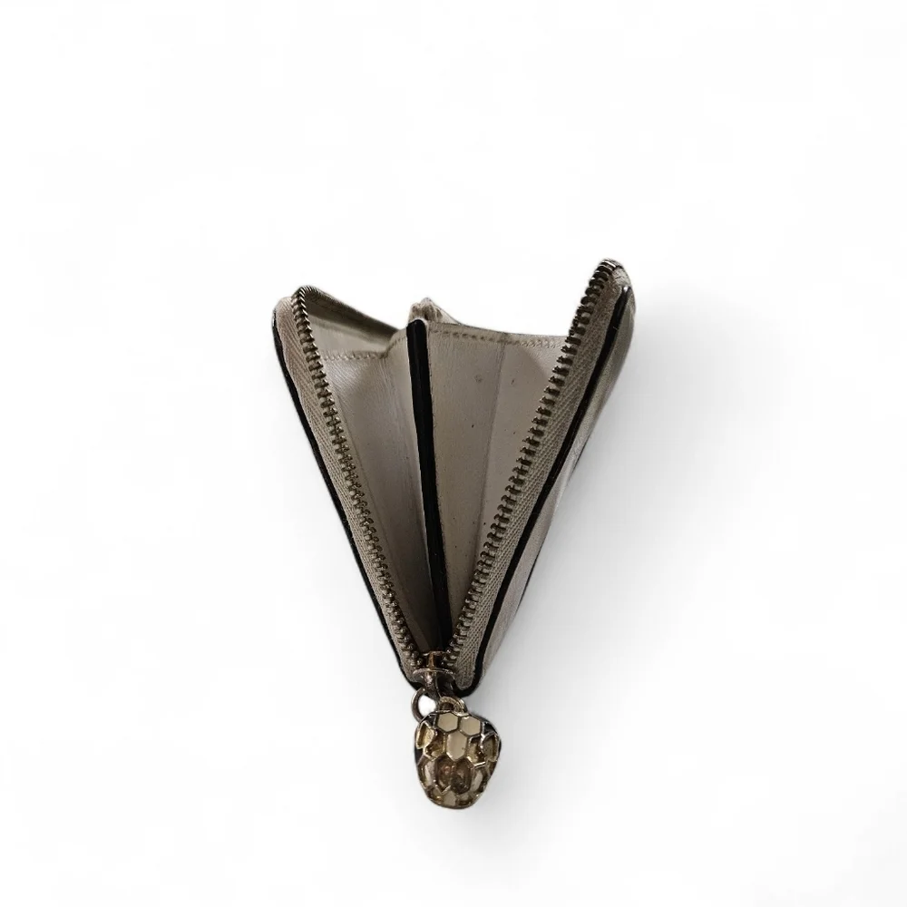 Bvlgari Zippered Seepento Wallet In Cream And Gold